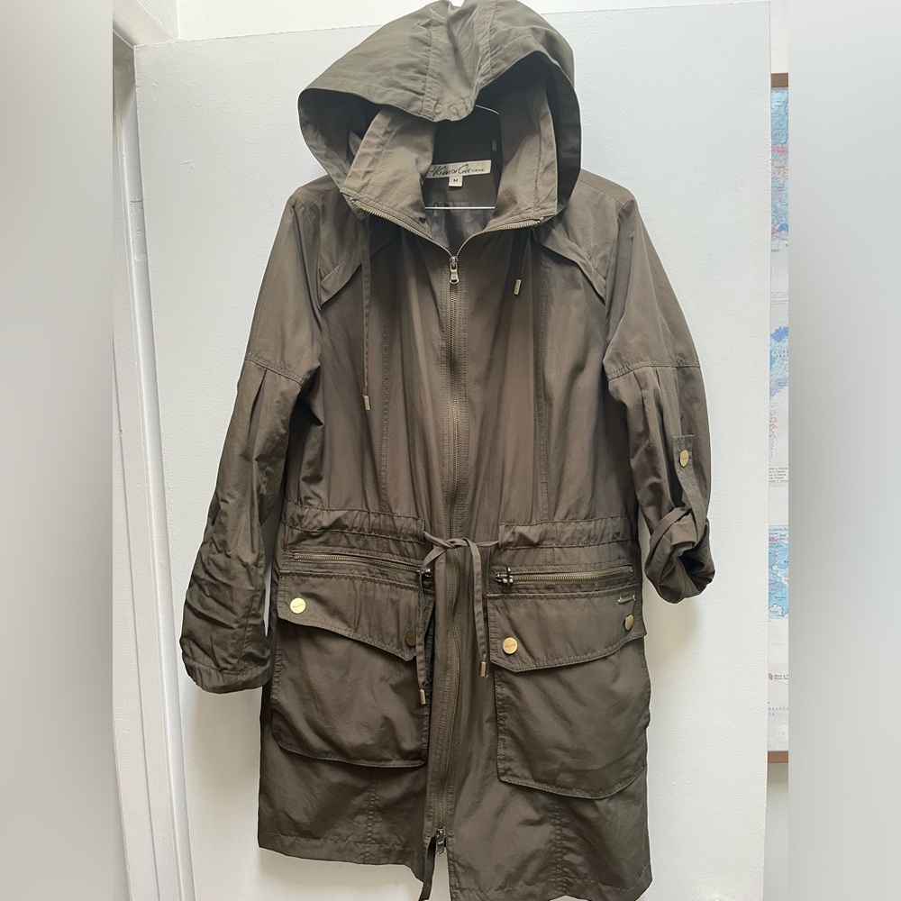 Very versatile & stylish mid length utility Kenneth Cole green khaki jacket.